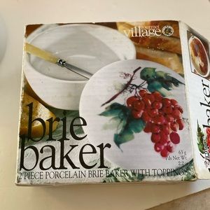 Gourmet Village Brie Baker. Porcelain with fruit graphic on lid.